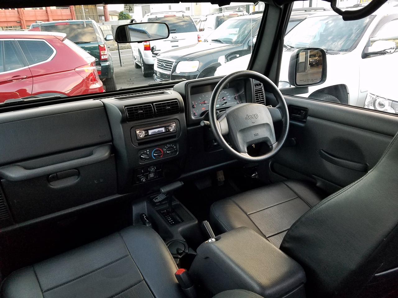 「スポーツ ソフトTOP&フルメタルドア ブッシュワーカーOFカスタム デイトナブラックW&マッドテレンタイヤ 黒革調シート CDコンポ 」詳細イメージ画像です